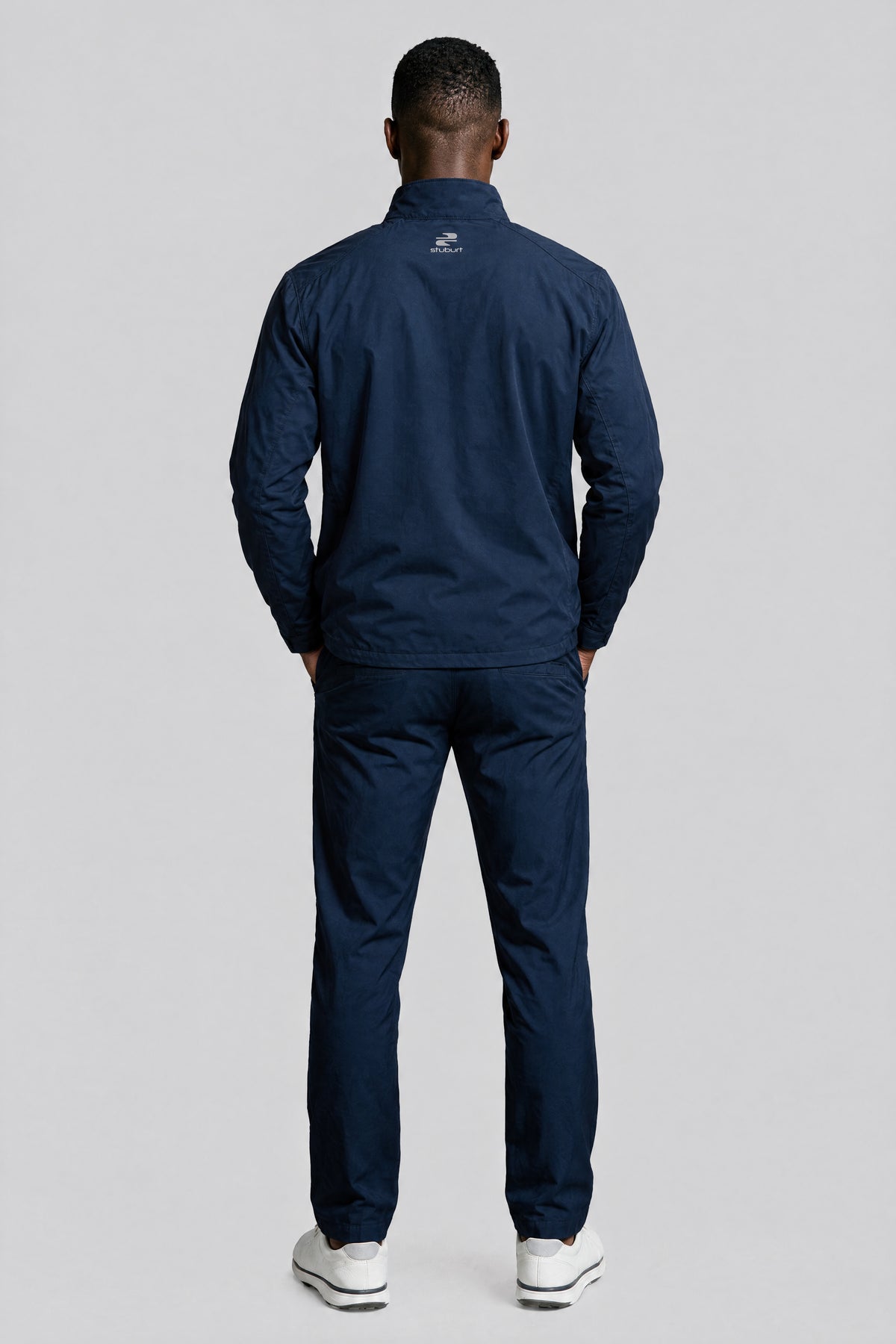 The waterproof golf suit in Navy, back