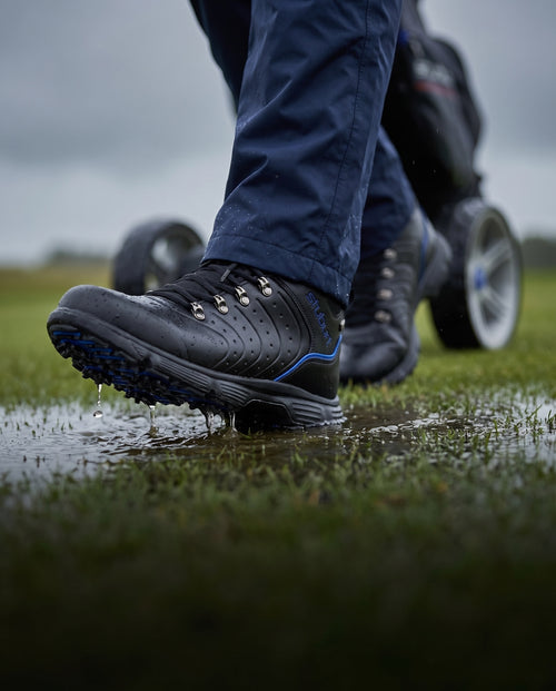 Stuburt Evolve Sport II waterproof boot worn on a wet course