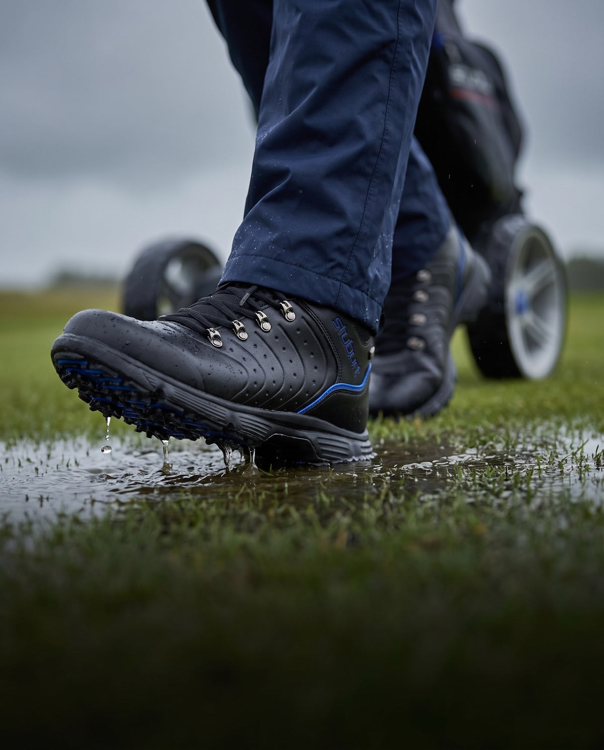 Stuburt Evolve Sport II waterproof boot worn on a wet course 