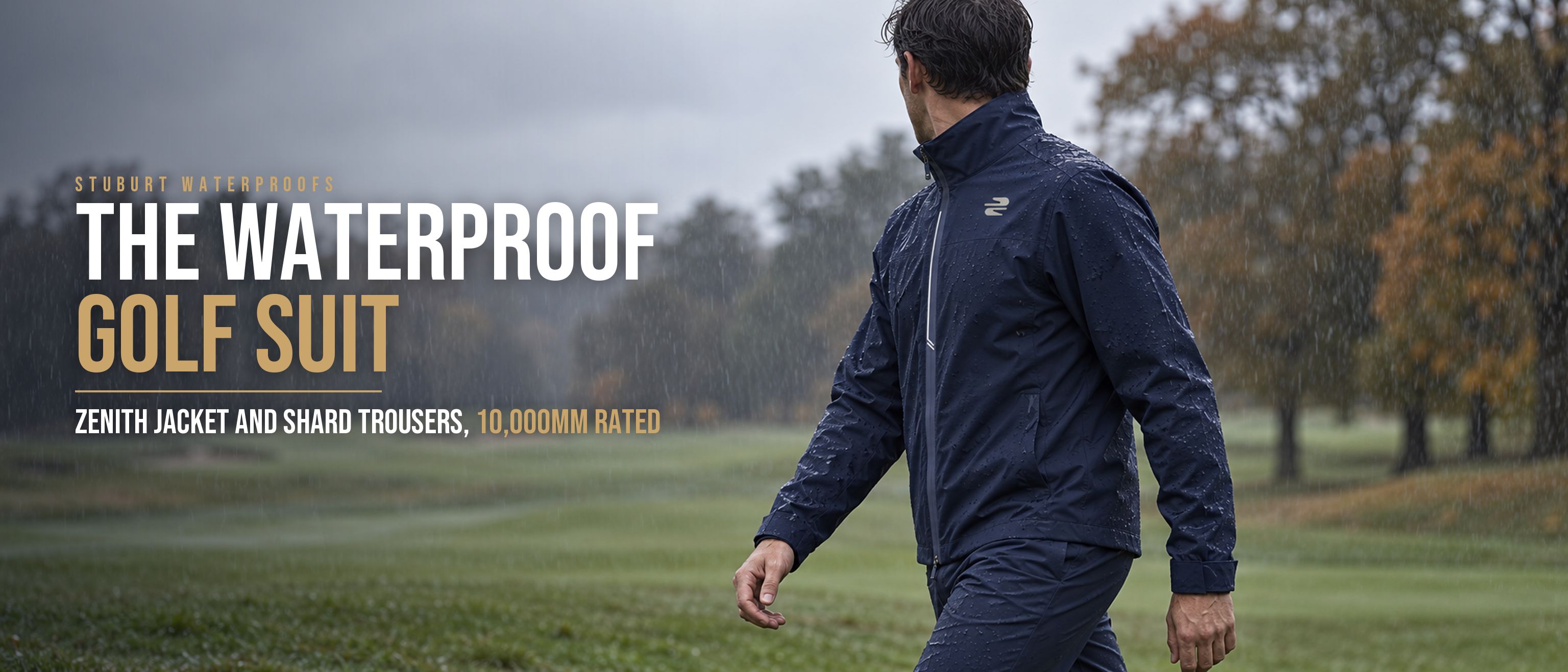 A golfer walking a fairway in the rain in the Stuburt waterproof golf suit: Zenith jacket and Shard trousers, 10,000mm rated